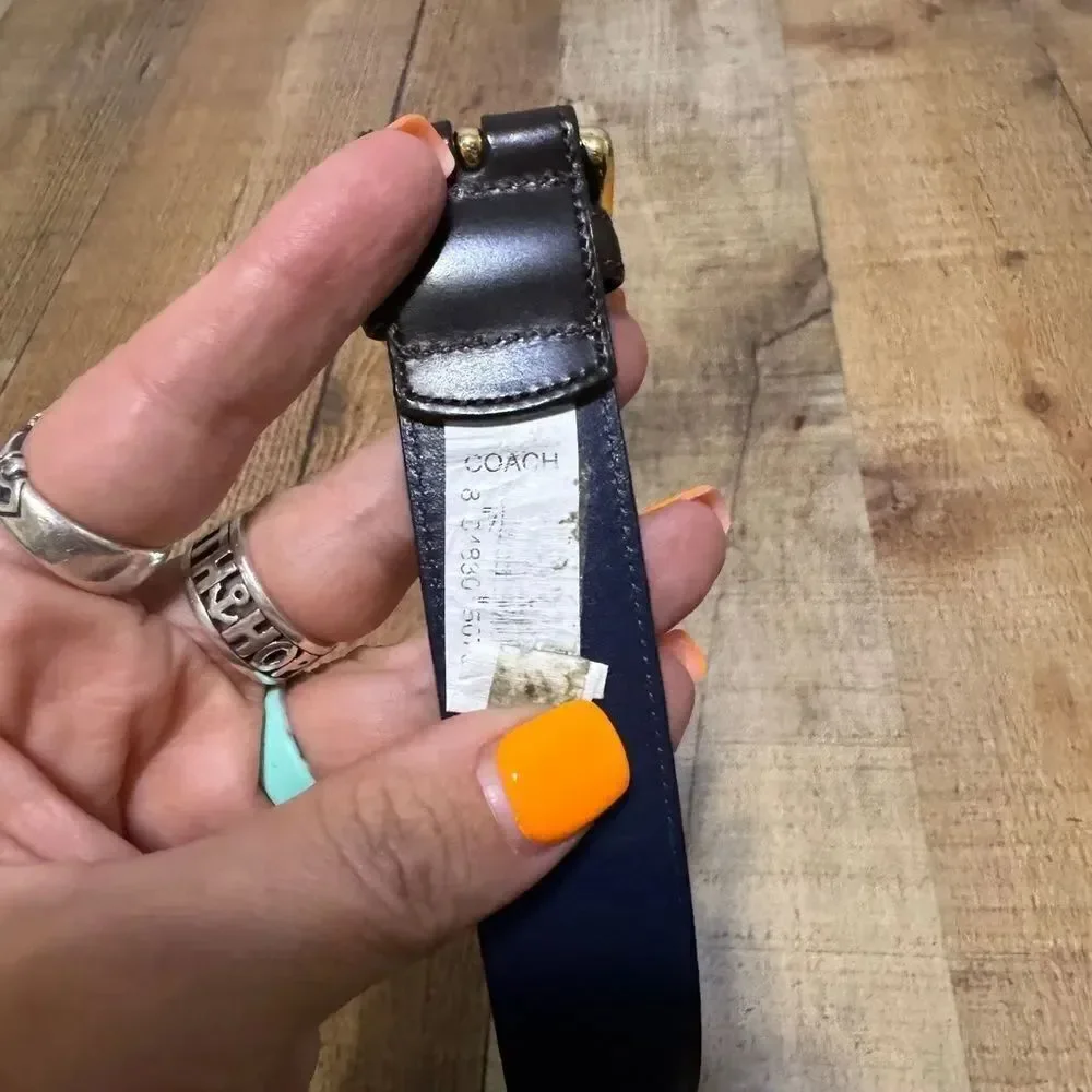 Black leather coach belt *has flaw